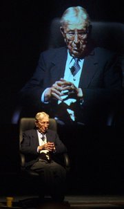 Former UCLA basketball coach John Wooden spoke to a full house at Johnson Fine Arts Center on the campus of Northern State University in Aberdeen, S.D., during an appearance in this file photo from 2002. Wooden, one of the most revered coaches of all time, died on Friday. He was 99.