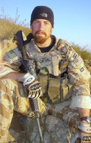 This photo provided by family shows Darren James LaBonte, 35, in Afghanistan in 2007. LaBonte was one of seven CIA employees who died when a suicide bomber blew himself up at a U.S. base in Khost, Afghanistan, on Dec. 30, 2009.