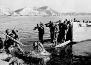 Troops of the First U.S. Cavalry Division land ashore July 19, 1950, at Pohang on the east coast of Korea during the Korean War. The war that began in Korea 60 years ago, on June 25, 1950, a ghastly conflict that killed millions and left the peninsula in ruins, became “The Forgotten War” in many American minds.