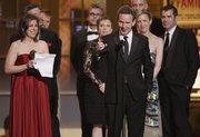 Author John Logan accepts the Tony Award for Best Play for “Red” during the 61st Tony Awards on Sunday in New York.