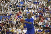 Kansas guard Tyshawn Taylor shoots three-pointers and free throws in front of campers at Bill Self’s basketball camp on Monday at Horejsi Center.