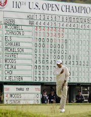 Tiger Woods reacts to his missed eagle putt on the 18th hole during the third round of the U.S. Open golf tournament on Saturday at the Pebble Beach Golf Links in Pebble Beach, Calif.