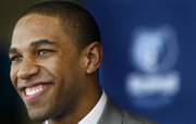 Newly drafted Memphis player Xavier Henry greets the media and fans during a news conference Friday afternoon at the FedEx Forum in Memphis.