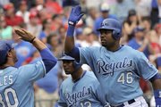 Kansas City’s Wilson Betemit (46) receives congratulations after his second-inning home run against St. Louis. Betemit’s homer helped the Royals beat St. Louis, 10-3, Sunday in Kansas City, Mo.