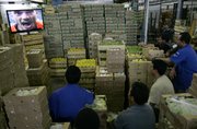 Brazilian soccer fans at the central market in Sao Paulo watch on television as Wesley Sneijder of the Netherlands celebrates his goal against Brazil during a World Cup quarterfinal soccer match last week.