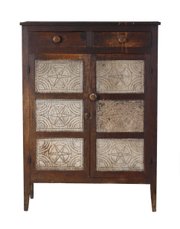 Butternut wood was used to make this pie safe in about 1830. The star designs in the punched tin give it added value. It sold this year at Cottone Auctions in Geneseo, N.Y., for $1,955.