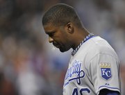 The Kansas City Royals’ Wilson Betemit leaves the field after being forced out at second to end the game against the Chicago White Sox. The Royals lost, 5-1, on Saturday in Chicago.