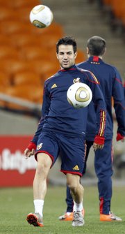 Spain’s Cesc Fabregas takes part in a training session at Soccer City Stadium on Saturday in Johannesburg. The Netherlands and Spain face each other today in the World Cup final.