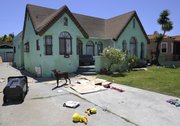 The home of Lonnie David Franklin Jr., who was arrested by Los Angeles police in connection with the “Grim Sleeper” serial murder case one week ago, sits abandoned Wednesday in South Los Angeles.
