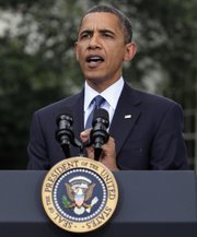 President Barack Obama speaks to reporters Thursday outside the White House in Washington. Striking a deeply partisan tone in his weekly radio and online address Saturday, Obama said Senate Republicans are playing politics with bills that would extend benefits to the unemployed and increase lending to small businesses.
