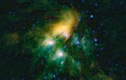 The famous Pleiades cluster of stars is seen through the eyes of WISE, or NASA’s Wide-field Infrared Survey Explorer, shown in this image provided by NASA on Friday. The mosaic contains a few hundred image frames — just a fraction of the more than 1 million WISE has captured so far as it completes its first survey of the entire sky in infrared light.