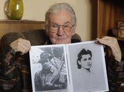 Jerzy Bielecki presents photos of him in 1944, left, and Cyla Cybulska in 1945, in his home in Nowy Targ, southern Poland, in this May 11 photo. Sixty-six years ago, Bielecki, then an Auschwitz Birkenau prisoner, escaped from the death camp with his Jewish girlfriend, Cybulska.