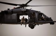 Pararescuemen, or “PJs,” of the 58th Rescue Squadron deployed to Afghanistan from Nellis Air Force Base, Las Vegas, take off Tuesday during a mission aboard a Pavehawk CASEVAC helicopter in Kandahar province. The PJs and U.S. Air Force helicopter pilots and crews are part of the 451st Air Expeditionary Wing based at Kandahar Air Field that provides a variety of air assets to the NATO war effort in southern Afghanistan.