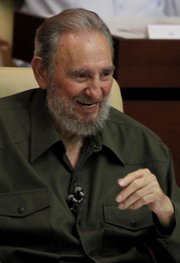 Fidel Castro speaks during a special session of parliament in his first official government appearance in front of lawmakers in four years Saturday in Havana, Cuba.
