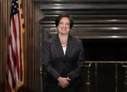 Elena Kagan smiles after becoming the Supreme Court’s newest member Saturday at the Supreme Court Building in Washington. Kagan, 50, who replaces retired Justice John Paul Stevens, becomes the fourth woman to ever sit on the high court.