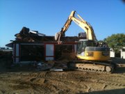 Construction crews tear down McDonald's, 901 W. 23rd Street, on Tuesday, August 10, 2010. The building was constructed 40 years ago, and was the first McDonald's in Lawrence.