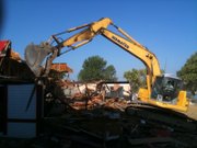 Construction crews tear down McDonald's, 901 W. 23rd Street, on Tuesday, August 10, 2010. The building was constructed 40 years ago, and was the first McDonald's in Lawrence.
