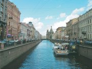 This canal shows a distant view of the Church of the Savior on Spilled Blood. The church was built on the location where Tsar Alexander II of Russia was assassinated.