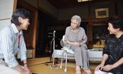 A Kobe city official, left, visits 100 year-old Mitsue Watase, center, Tuesday at Watase’s home in Kobe, western Japan, as the officials started a door-to-door survey on the whereabouts of centenarians. Japan prides itself on having the world’s longest life expectancy, but it is now struggling with revelations that hundreds listed as its oldest citizens are either long dead or haven’t been heard from for decades.