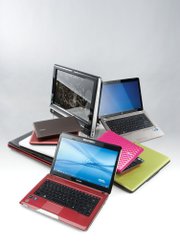 This summer’s computer models feature cosmetic changes such as bright colors mixed with graphics, according to Consumer Reports.