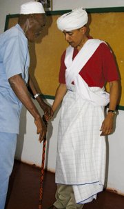 In this 2006 file photo, then-Sen. Barack Obama, D-Ill., right, is dressed as a Somali Elder by Sheikh Mahmed Hassan, left, during his visit to Wajir, a rural area in northeastern Kenya, near the borders with Somalia and Ethiopia.