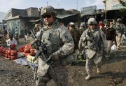 U.S. soldiers patrol Dec. 2, 2009, through the heart of Kabul, Afghanistan. A majority of Americans see no end in sight in Afghanistan, and nearly six in 10 oppose the nine-year-old war as President Barack Obama sends tens of thousands more troops to the fight, according to a new Associated Press-GfK poll.