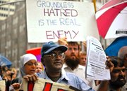 Demonstrators in favor of the proposed Islamic center near ground zero make their feelings about the emotionally charged subject known Sunday on Church Avenue in lower Manhattan.