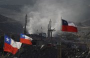 Drills work on the San Jose collapsed mine Tuesday where 33 miners are trapped in Copiapo, Chile. The miners, who have been trapped since the shaft they were working in collapsed on Aug. 5, were confirmed to be alive Sunday when they were reached by rescue teams via a small hole through which they could pass messages and see the miners with a camera.