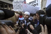 Surrounded by reporters and demonstrators, Imam Abdallah Adhani arrives for prayers at the proposed site for an Islamic cultural center Friday in New York.