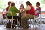 Friends, clockwise from center, Nicole Suchy, Ruth Hughes, Susan Sloop, Susan Wakefield and Angela Loch enjoy a cup of yogurt at 3 Spoons Yogurt in honor of Suchy's birthday on Tuesday, Sept. 14, 2010.