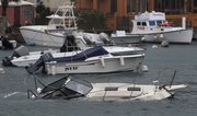 A boat is swamped with water at Flatts Inlet in Smith’s parish while Hurricane Igor passes near Bermuda on Sunday.