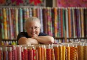 Sarah Fayman, owner of Sarah’s Fabrics since 1973, couldn’t think of another name for her store, 925 Mass., so she settled on her own.