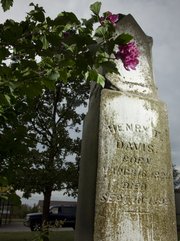 A large monument marks the grave of Henry T. Davis, who died in 1892, long before becoming the namesake of Henry T’s Bar and Grill, 3520 W. Sixth St. Davis had a farm on the property where the restaurant sits today.