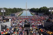 Activists gather at the Lincoln Memorial in the nation’s capital to participate in the “One Nation Working Together” rally to promote job creation, diversity and tolerance Saturday in Washington, D.C.