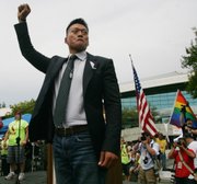 Former Lt. Dan Choi, an Iraq combat veteran who was discharged under the U.S. military’s “don’t ask, don’t tell” policy, appears at an equality rally in Fresno, Calif., in this May 30, 2009, file photo. A federal judge issued a worldwide injunction Tuesday stopping enforcement of the “don’t ask, don’t tell” policy, ending the military’s 17-year-old ban on openly gay troops.