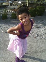 This undated photo released by the Kilodavis family shows 5-year-old Dyson Kilodavis of Seattle. Cheryl Kilodavis, Dyson’s mother, self-published “My Princess Boy” over the summer about the sometimes cruel reaction Dyson faces when he wears sparkly frocks, twirly skirts and blingy jewelry.
