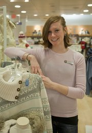 Angela Schwab, Louisville, Ky., won't be heading home for Thanksgiving. Instead, Schwab will help out at the Gap store in downtown Lawrence through the holiday.