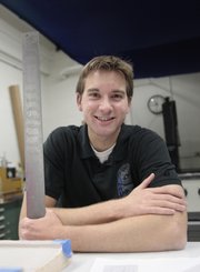 Kevin Shipley, Lincoln, Neb., senior, has opted to stay in Lawrence to work on his semester-long senior aerospace engineering design project, which is due Monday.