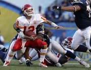Kansas City quarterback Brodie Croyle (12) gets sacked by San Diego linebacker Stephen Cooper during the second half. The Chiefs were blanked, 31-0, Sunday in San Diego.