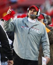 Kansas City Chiefs coach Todd Haley watches a replay during the second half of an NFL football game against the Tennessee Titans at Arrowhead Stadium in Kansas City, Mo., Sunday, Dec. 26, 2010. The Chiefs defeated the Titans 34-14.