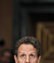 Treasury Secretary Timothy Geithner testifies Dec. 16, 2010, on Capitol Hill in Washington before the Congressional Oversight Panel hearing on TARP. The United States just passed a dubious milestone: Government debt surged to an all-time high, more than $14 trillion. Geithner says failure to increase borrowing authority would be “a catastrophe,” perhaps rivaling the financial meltdown of 2008-2009.