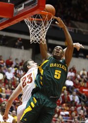 Baylor center Perry Jones (5) drives to the basket past Iowa State forward Jamie Vanderbeken during the first half of their game Saturday in Ames, Iowa. Though he had just 10 points and five boards against the Cyclones, Jones is considered by many to be a possible No. 1 pick in the upcoming NBA Draft. He’ll lead the Bears against KU in a Big Monday game tonight in Waco, Texas.