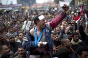 Egyptian anti-Mubarak protesters shout slogans during a demonstration Saturday in Tahrir square in Cairo, Egypt.