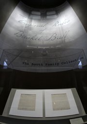 James Naismith&squot;s original rules of "Basket Ball" are displayed at the Nelson-Atkins Museum of Art on Friday, March 4, 2011, in Kansas City, Mo. David Booth and family purchased the rules at a Sotheby&squot;s auction for more than $4 million; after the museum display, the rules will be shown at the University of Kansas.