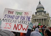 Demonstrators rally in support of Wisconsin workers Feb. 26 at the Illinois State Capitol in Springfield, Ill. As other states move to weaken public employee bargaining rights in the aftermath of the Wisconsin showdown, unions and their allies dare to hope they can turn rage into revival. This could be a make-or-break moment for a movement that brought the nation the 40-hour week, overtime pay, upward mobility, and now a struggle to stay relevant in the modern age.