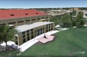 This is an image from a virtual 3D model of Allen Fieldhouse, set to be available this afternoon through Google Earth. By the end of next week, users of the program will be able to step inside and look around at the playing area&squot;s — from any and every angle, even from standing on the catwalks above the scoreboard. "I&squot;ve always wanted to (go up there), but never had the chance," said Brian McClendon, a KU graduate and fan who is vice president and co-founder of Google Earth.