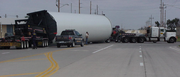 This truck is carrying a piece of a wind tower in the western Kansas town of Oakley. Overweight loads hauling wind turbine components have increased 700 percent since 2006.