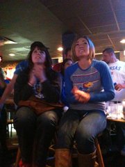 Kansas fans watch the Jayhawks take on VCU in an Elite Eight matchup Sunday, March 27, 2011 at Buffalo Wild Wings in downtown Lawrence.