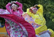 Jessica Bernman, left, and Jessica Garcia were part of the colorful dance group Fiesta Folklorica June 25, 2011, at the St. John's 29th Annual Mexican Fiesta.