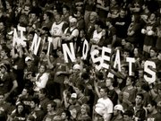 Students at a Kansas University basketball game use letters to spell out the famous Sherron Collins wisecrack "Ain&squot;t No Seats" during a game in February 2009.